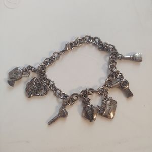 Silver makeup charm bracelet 8 inches